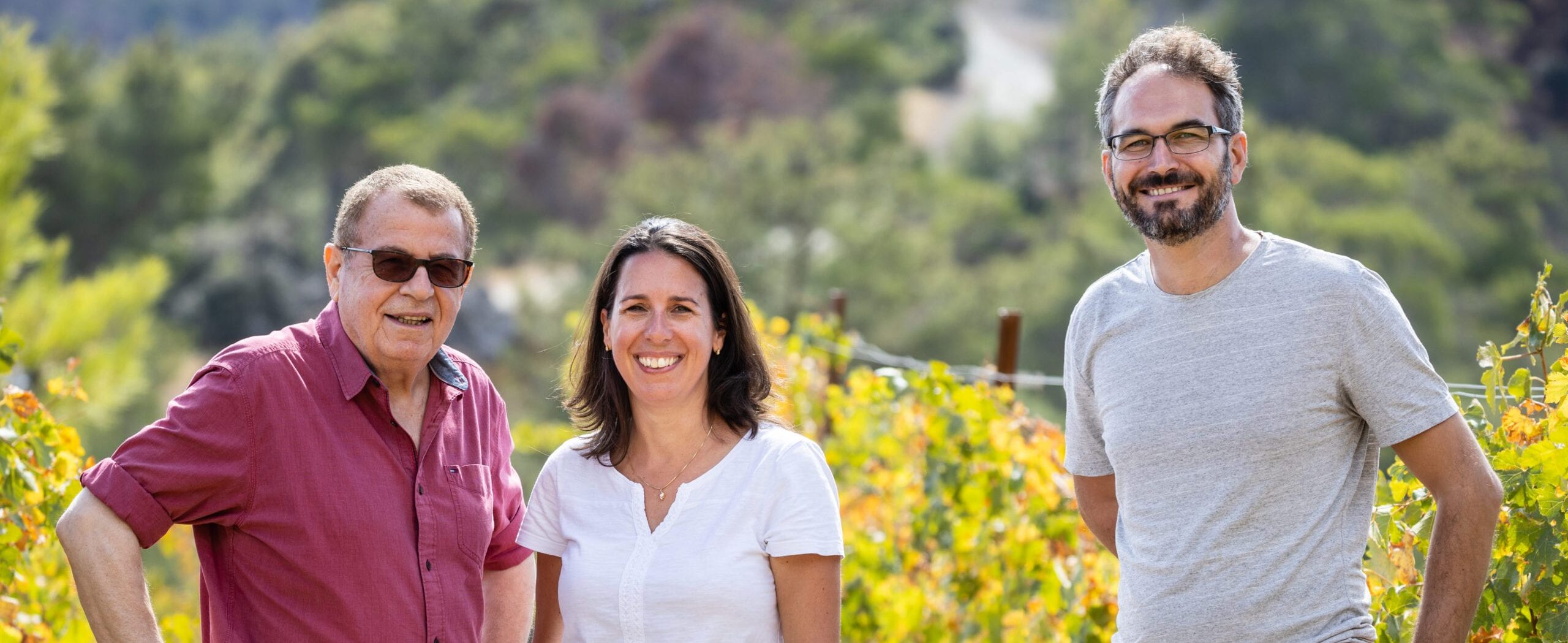 Owners Yiannakis Papadouris and Alexa Papadouris with winemaker Victoras Finopoulos, in the vineyards